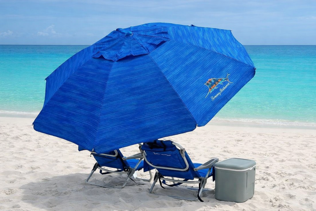 Beachside-Relaxation-Under-Vibrant-Umbrella-from-crabby joes