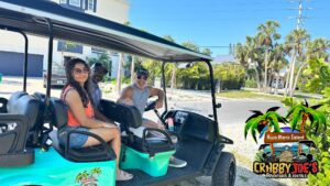 Friends Enjoying Golf Cart Ride Anna Maria Island